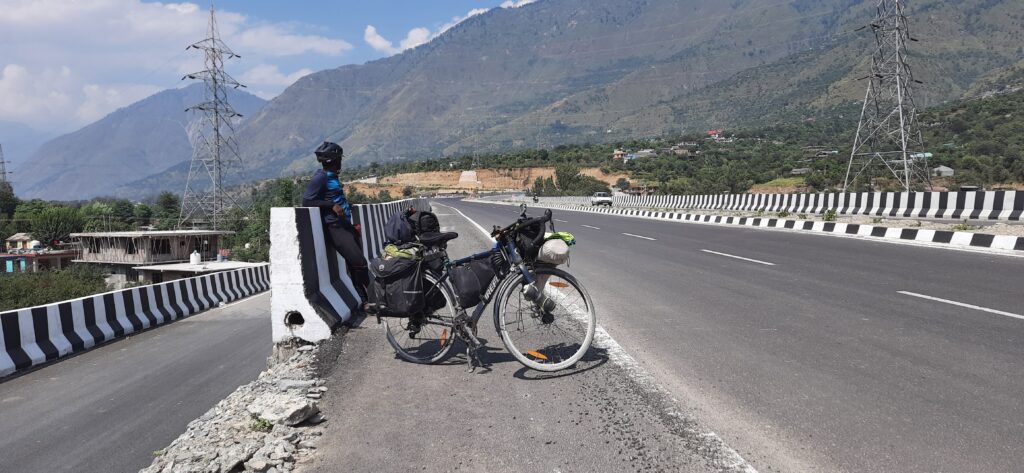 Me and My bike with the view of mountain's on NH3